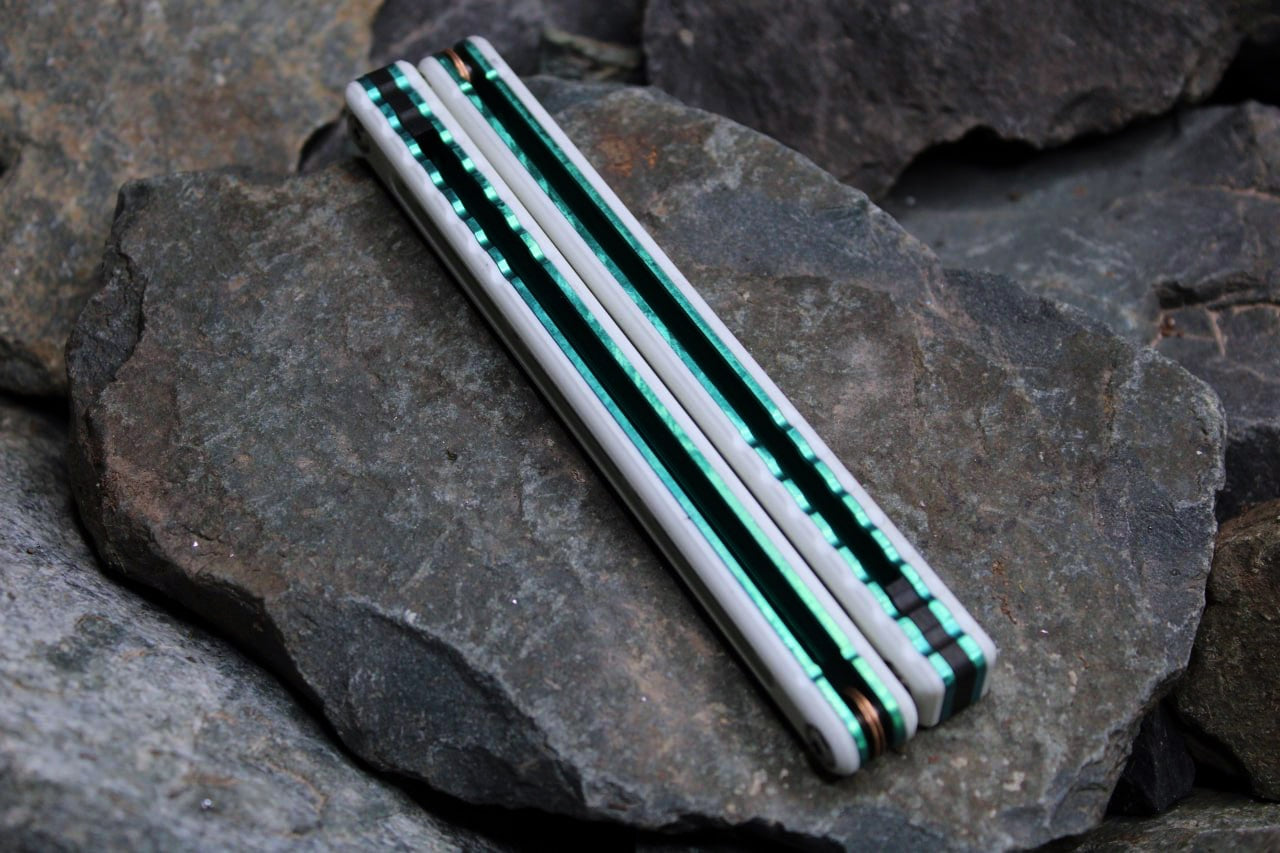 Titanium Nautilus Handles: White G10 w/ Emerald Green Anodization