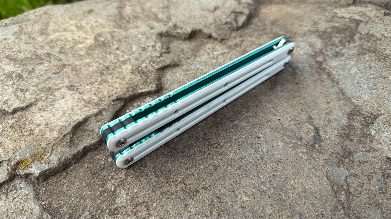S35VN Flagship Tanto G10 Kraken: White G10 w/ Jeweled Emerald Ano (Blem)