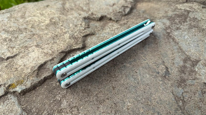 S35VN Flagship Tanto G10 Kraken: White G10 w/ Jeweled Emerald Ano (Blem)