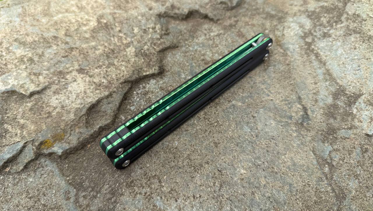 S35VN Flagship Tanto G10 Kraken: Black G10 w/ Jeweled Green Ano (sharpened swedge)